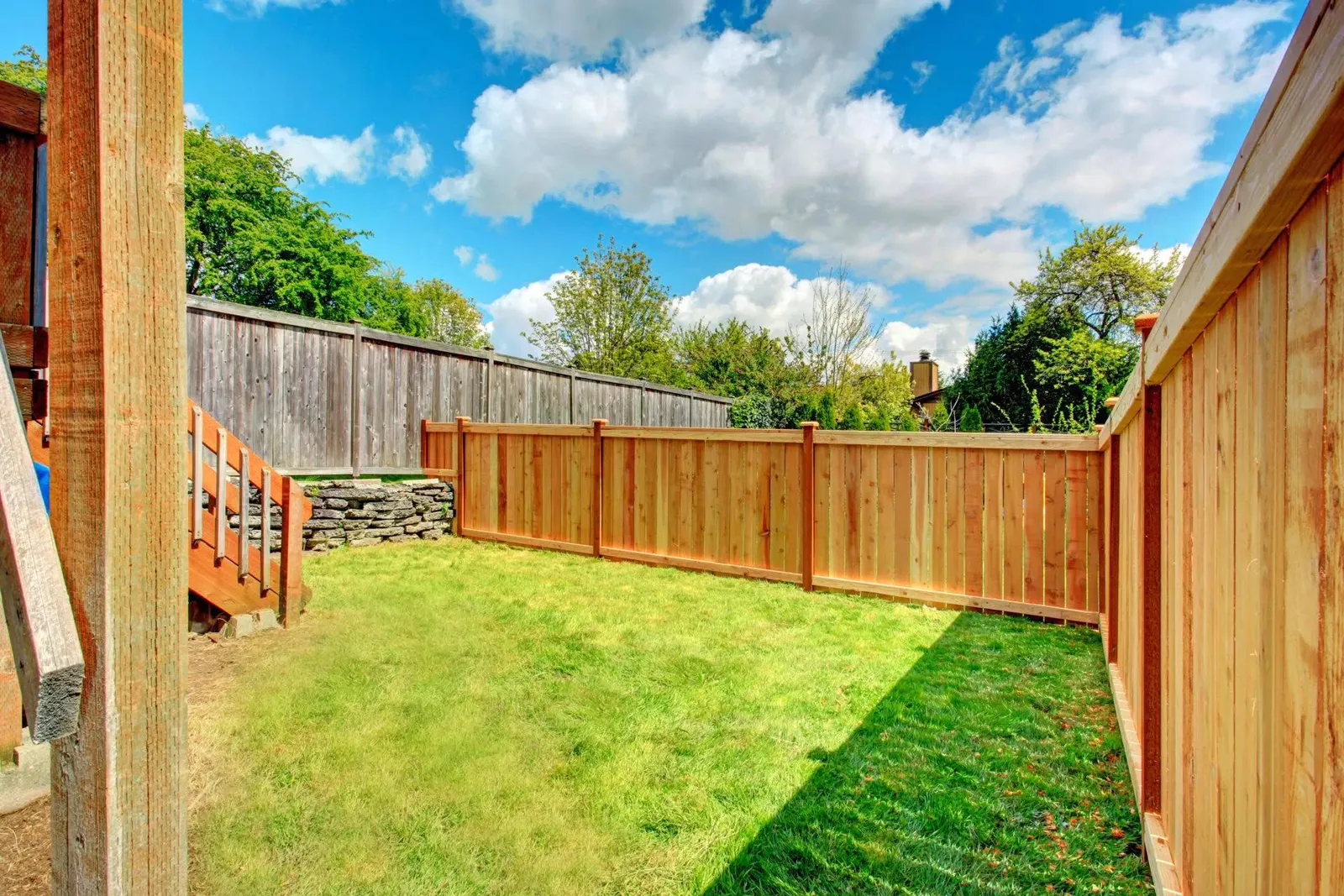 Wood privacy fence line in a London, KY backyard